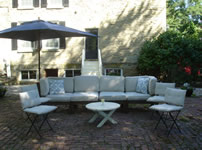 Relax on the patio at The Cothren House Historic Estate